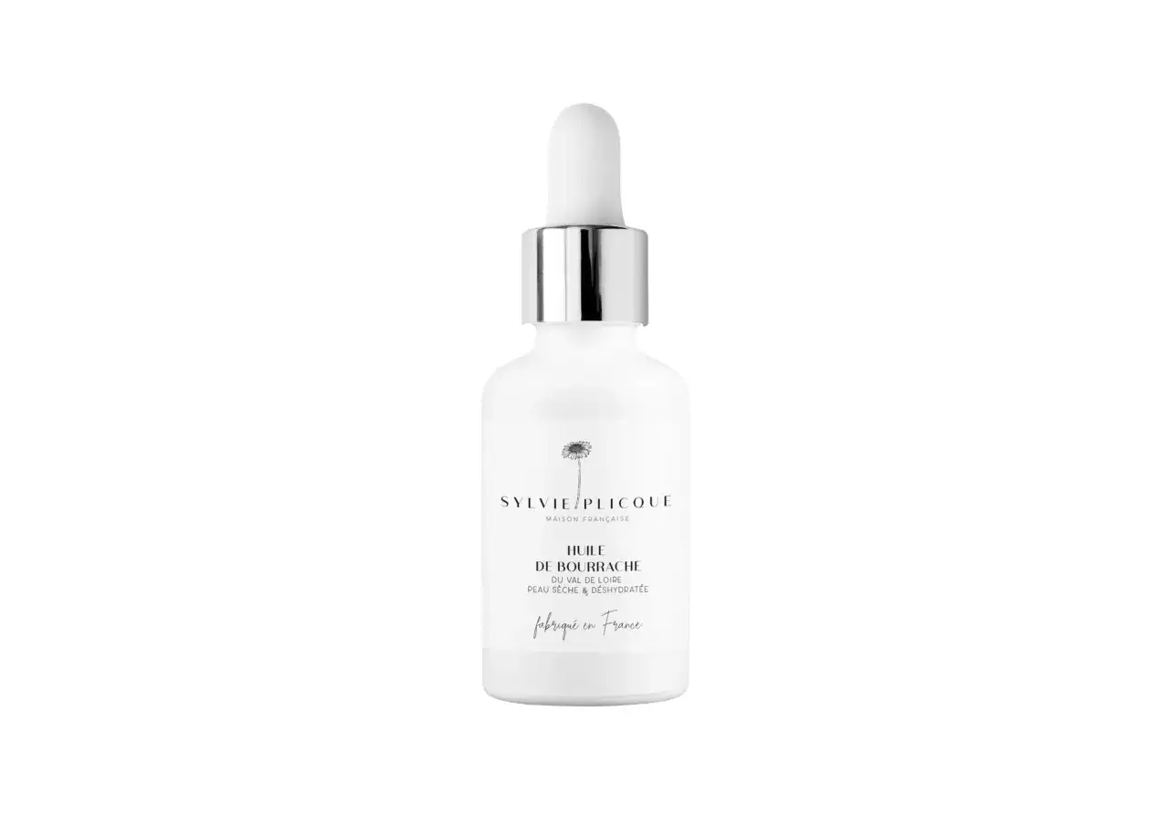 Flacon blanc avec pipette argentée. Huile de bourrache pour le visage, idéale pour peaux sèches et déshydratées. Découvrez les bienfaits de l'huile de bourrache visage.